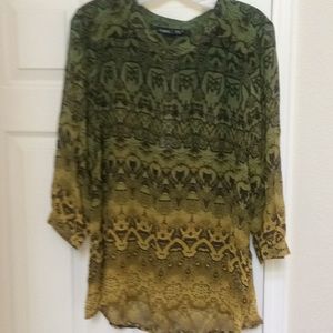 Beautiful top worn once and very interesting print